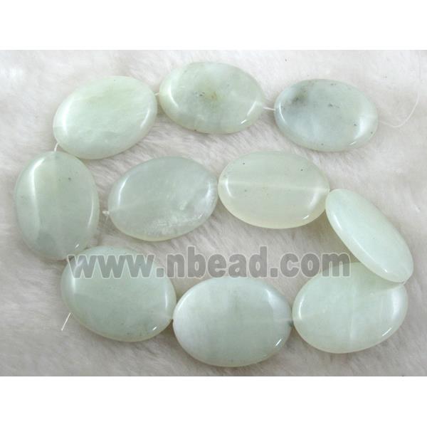 Flat oval jade bead