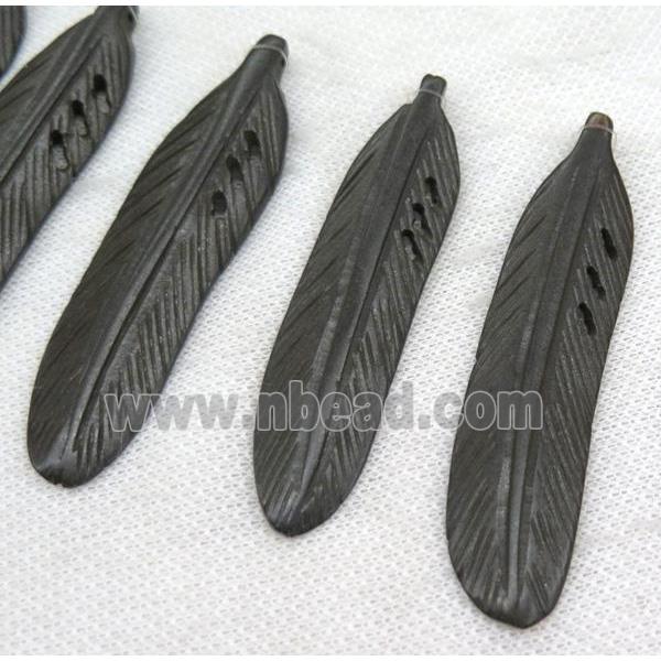 bone pendant, feather, black