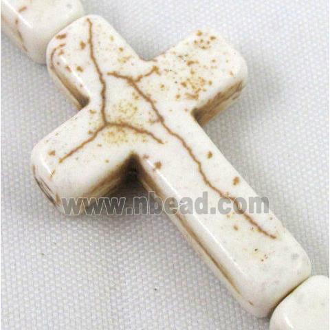 white synthetic Turquoise cross beads