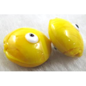  lampwork glass beads with evil eye, flat-round, yellow
