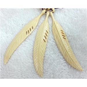 yellow cattle bone pendant, feather, approx 20x115mm