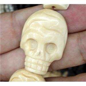 yellow antique cattle bone beads, skull, approx 23x32mm