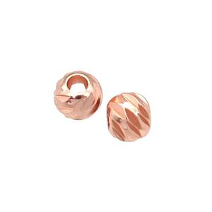 round copper carved beads, rose gold, approx 5mm dia