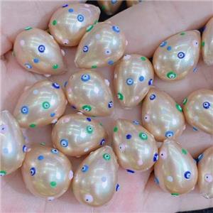 champagne Pearlized Shell teardrop beads with evil eye, approx 16-21mm