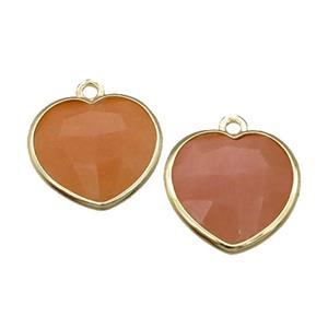 peach Sunstone heart pendant, gold plated, approx 15mm