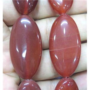 red agate bead, oval, approx 20x40mm