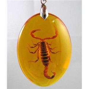 amber pendant, oval, golden, approx 36x52mm